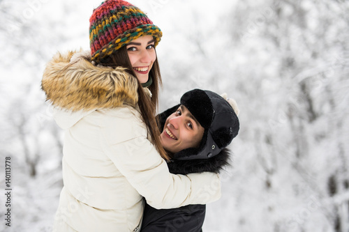 Young couple having fun and resting in park