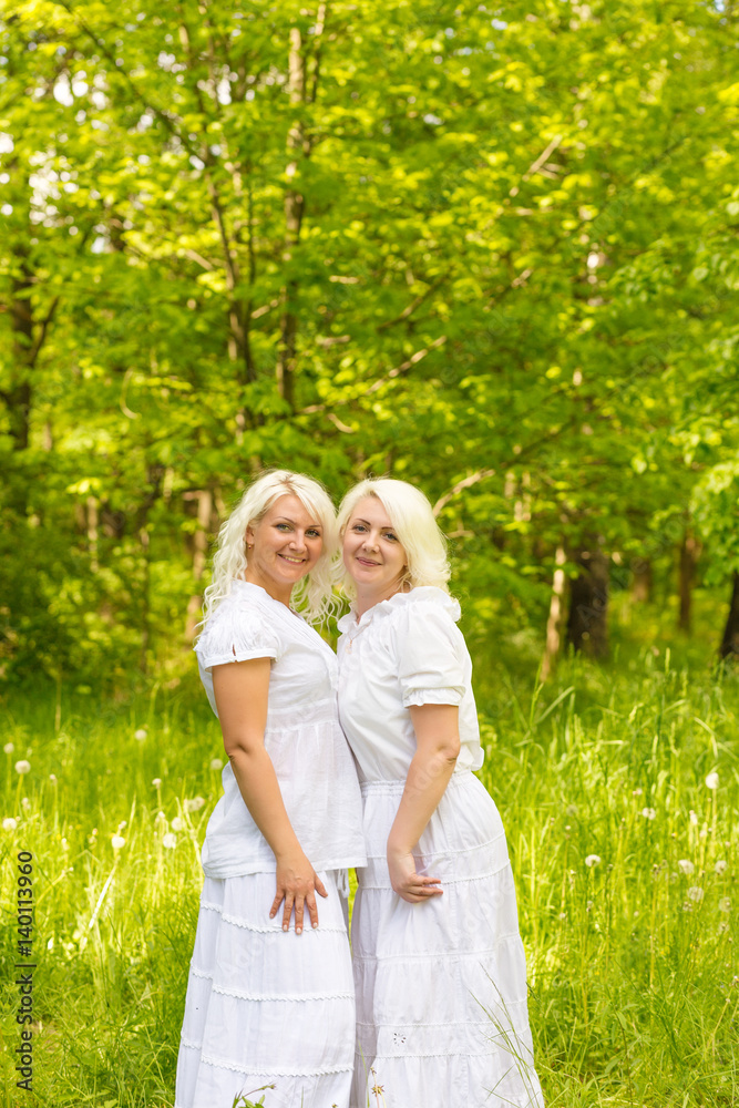 A large family is resting in nature A large family is resting in nature