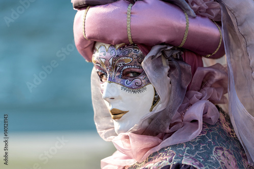 Incredible look of a person dressed up for Carnival in Venice photo