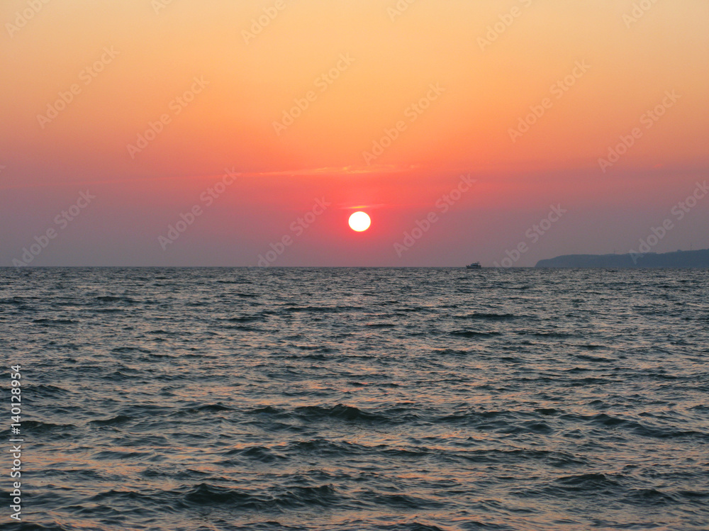 Fantastic crimson sea ocean sunset horizon sky photo