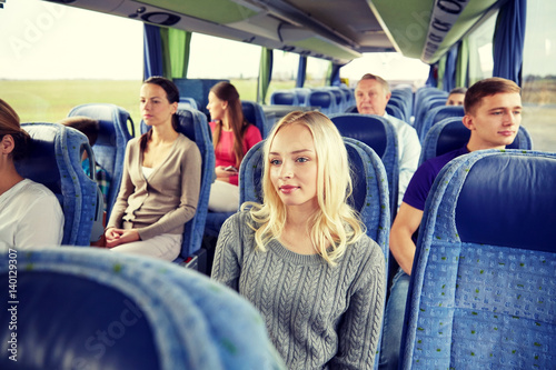 group of passengers or tourists in travel bus