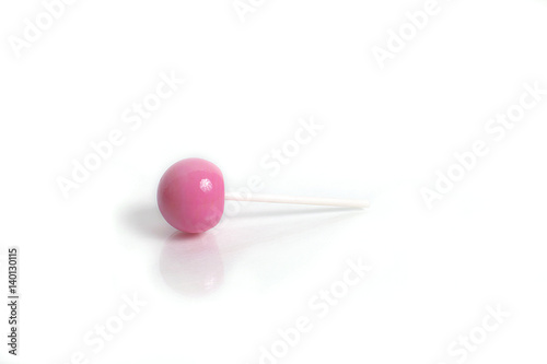 Pink lollipop isolated on a white background