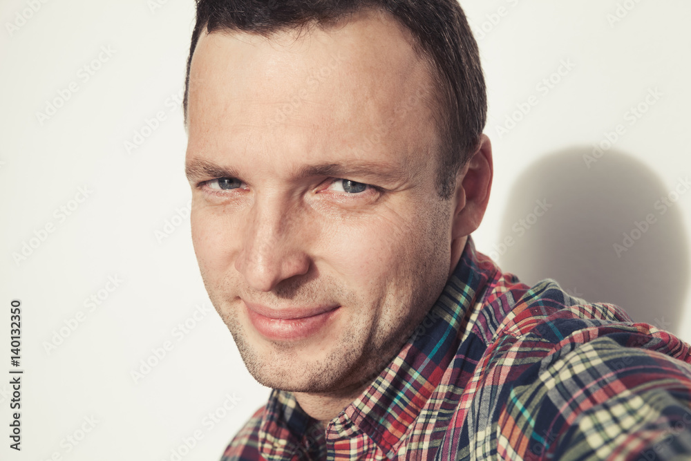 Smiling young adult Caucasian man Smiling young adult Caucasian man