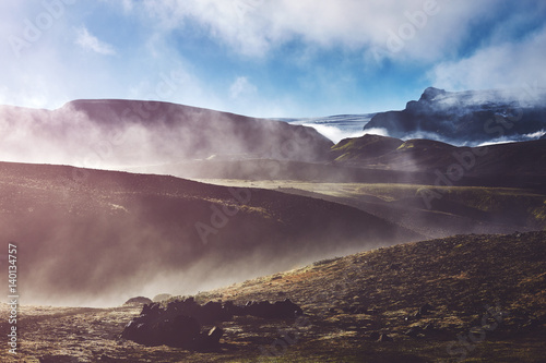 Travel to Iceland. Beautiful Icelandic landscape with mountains, sky and clouds. Trekking in national park Landmannalaugar. foggy morning in Camping . Travel concept.