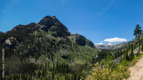 Mountain summit and glacial valley in early spring colors