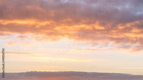 Beautiful sunset sky with cloud. © moomusician