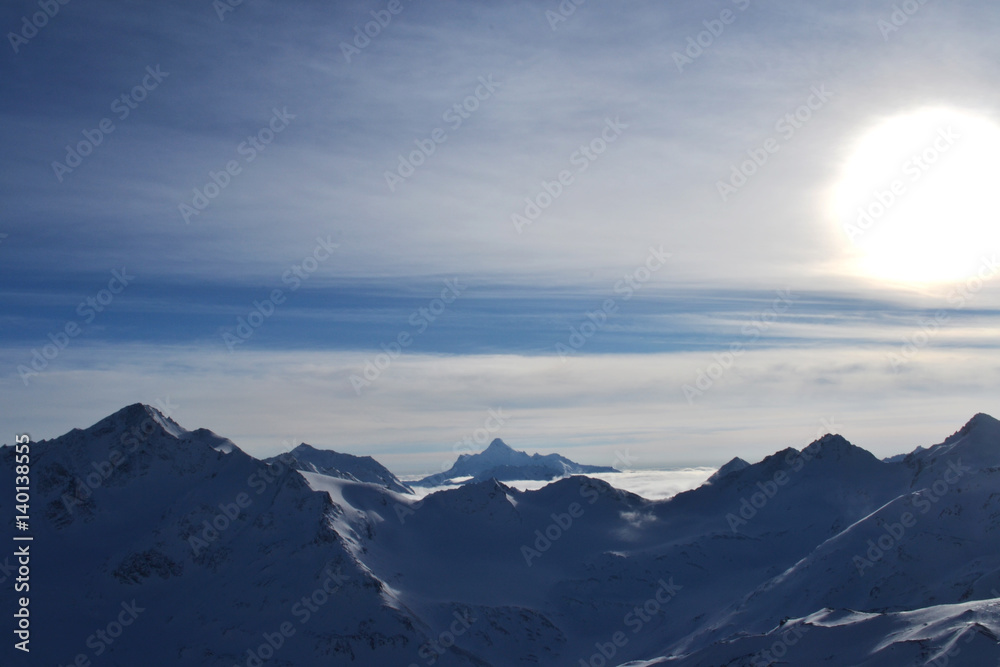 beautiful winter mountains with blue sky, snowy peaks. amazing scenic nature landscape.