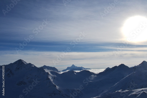 beautiful winter mountains with blue sky, snowy peaks. amazing scenic nature landscape. © mountain_jackdaw