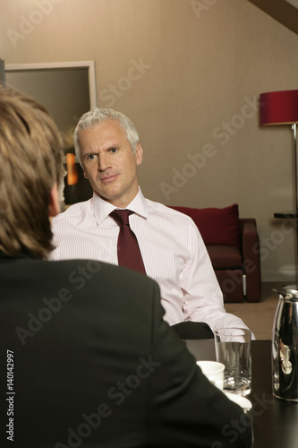 Two businessmen in a meeting