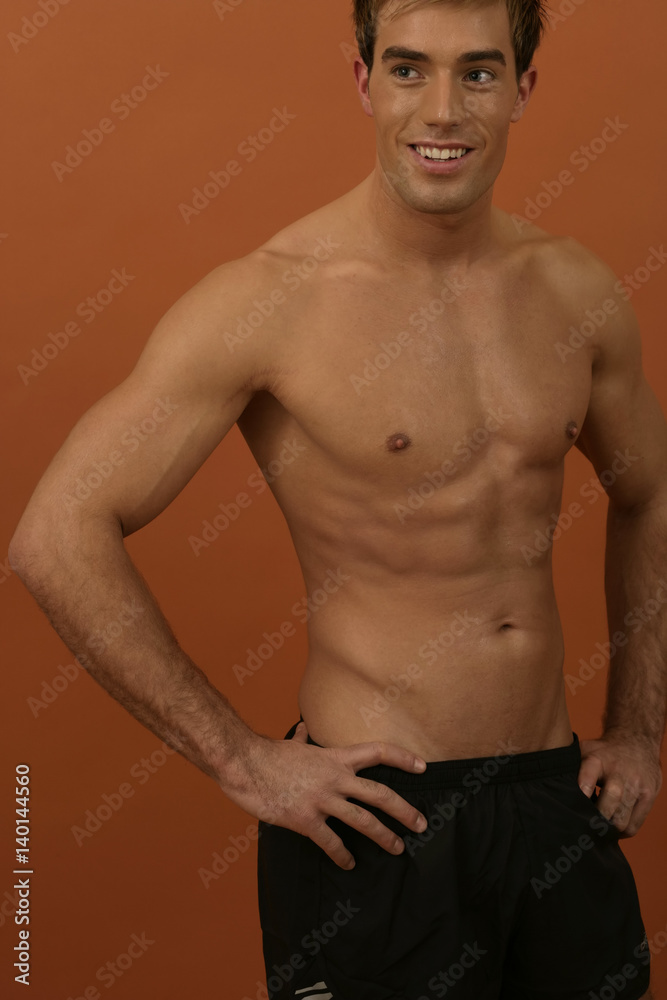 Fototapeta premium A topless putting his hands on his hip