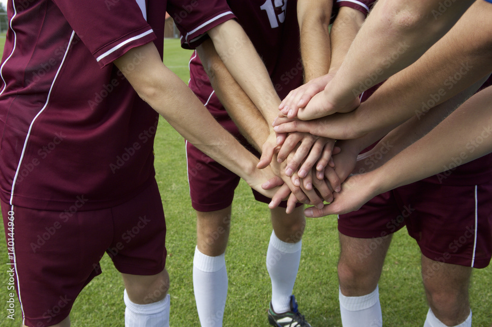 Kickers putting hands together Kickers putting hands together