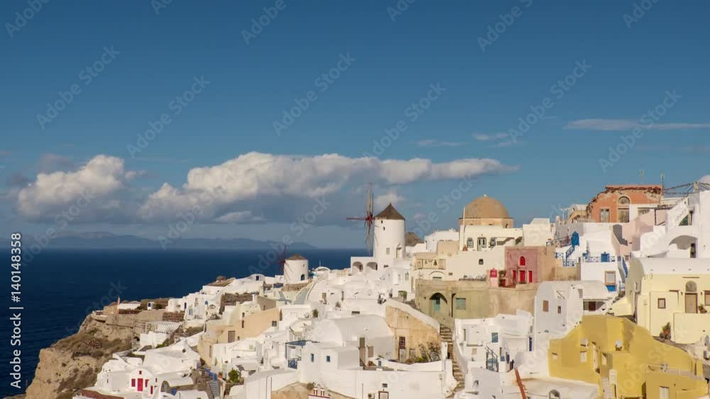 Clouds fly over Oia village in Santorini island in Greece. 4k Time lapse. Clouds fly over Oia village in Santorini island in Greece. 4k Time lapse.