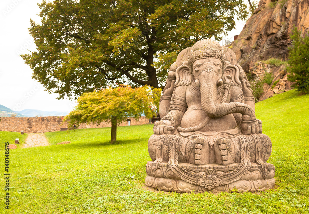 Ganesha statue in a beautiful mountain garden Ganesha statue in a beautiful mountain garden