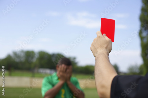 Referee showing red card