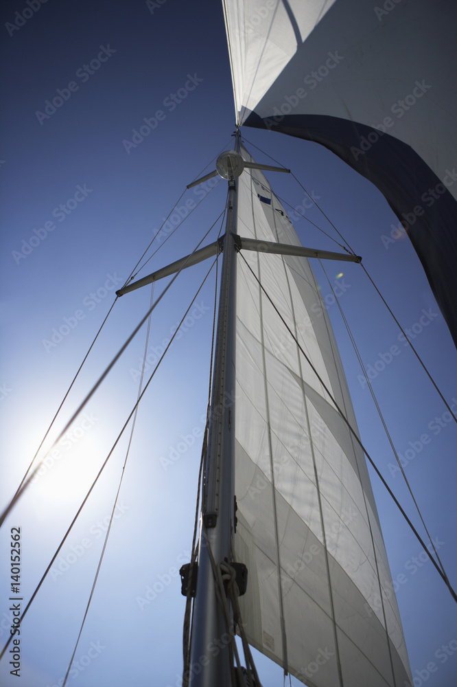 Sail, low angle view, lens flare