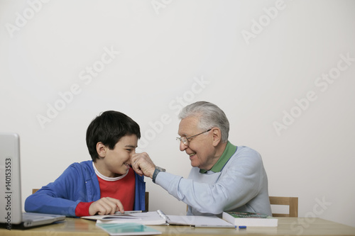 Grandfather pinching boy s nose  fully_released