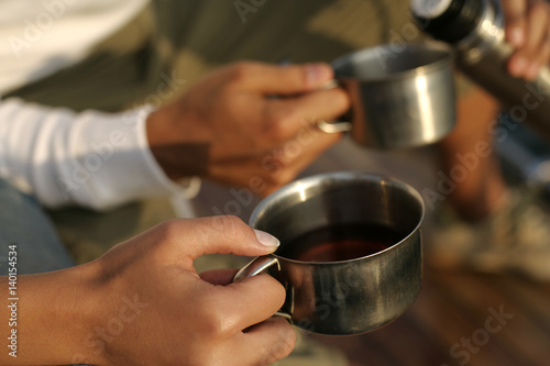 Pouring of tea © Gudrun