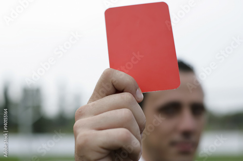 Referee showing the red card