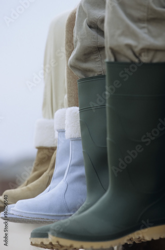 Three Pair of Legs with Rubber- and Winterboots - Clothing - Season © Gudrun