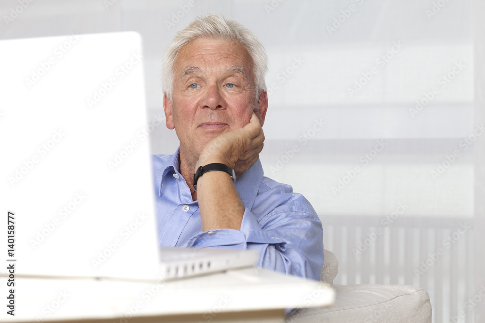 Fototapeta premium Senior man using laptop