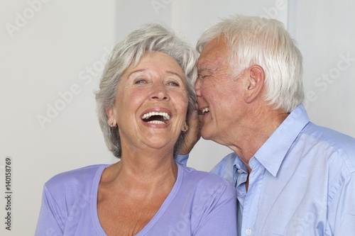 Senior couple whispering