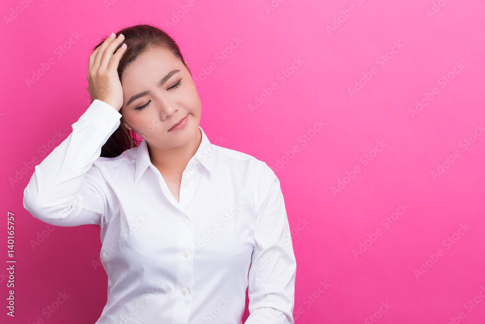 Woman has headache Woman has headache