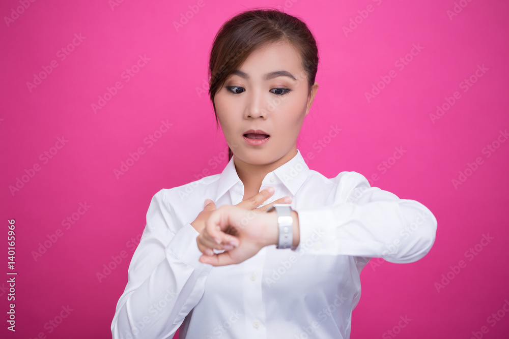 Shy woman check her watch she is late Shy woman check her watch she is late