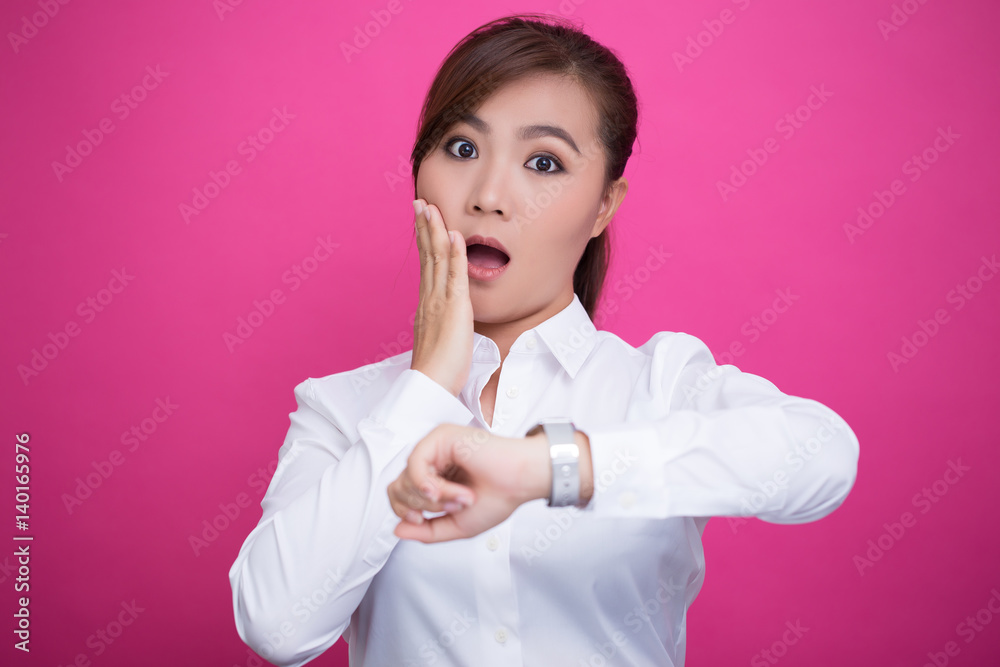 Shy woman check her watch she is late Shy woman check her watch she is late