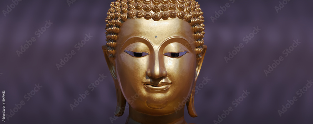 Golden Buddha statue close up