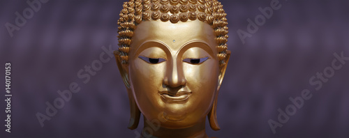 Golden Buddha statue close up