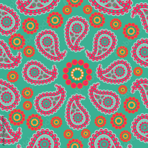 Paisley on a green background. Seamless pattern. Traditional folk pattern with Paisley. Bright, colorful. Design for textiles, wall hangings, wrapping paper.