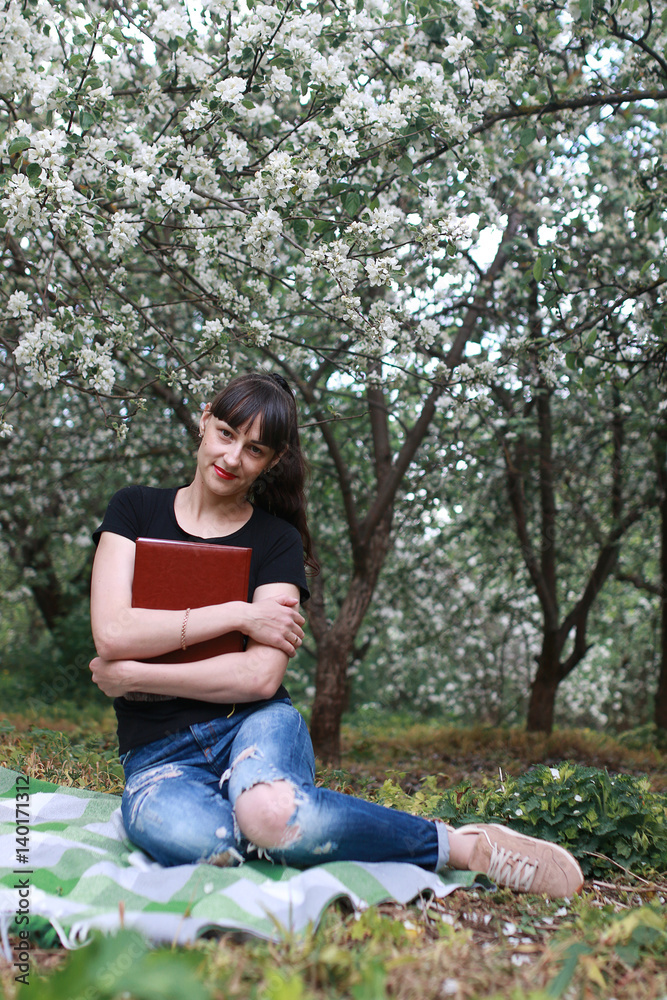 girl in a spring apple flower garden girl in a spring apple flower garden