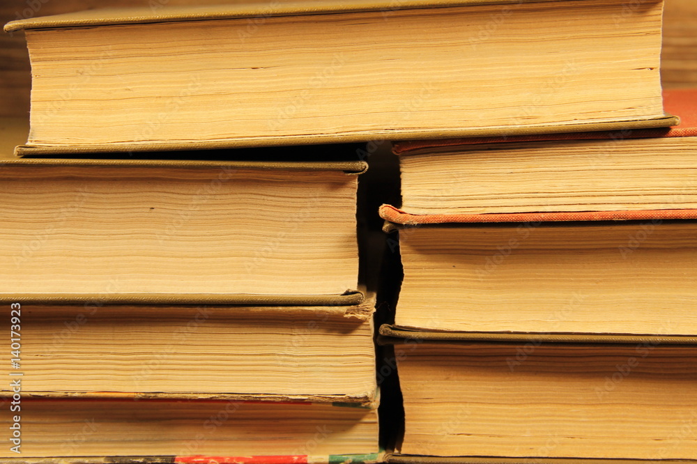 Fototapeta premium Stack of the old books. Books background