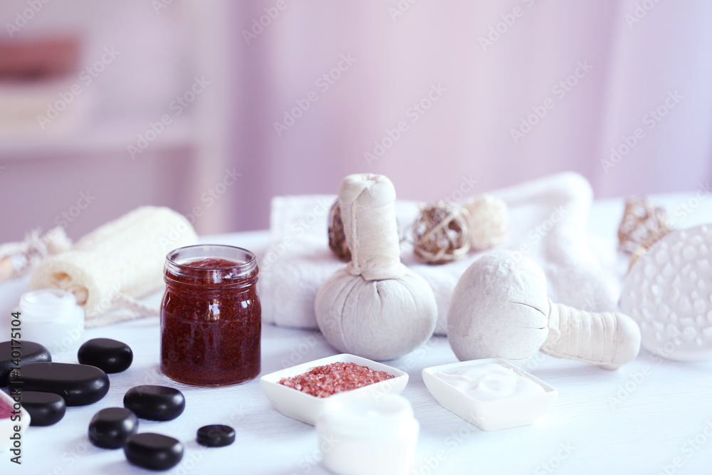 Spa treatments on white table in salon