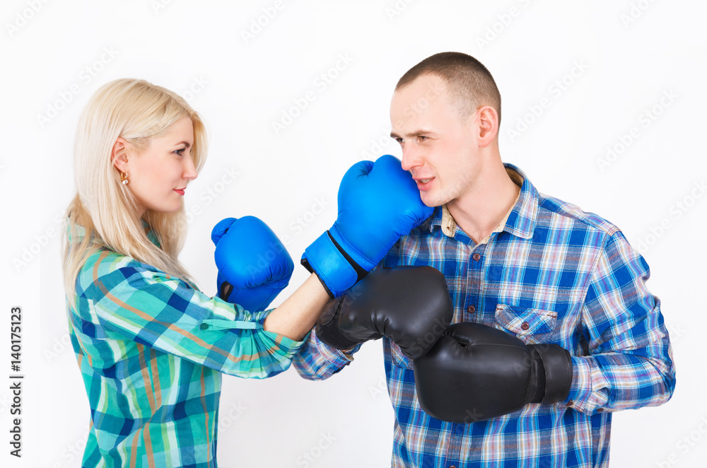 Studio shot of a beautiful funny couple expressive fighting. Studio shot of a beautiful funny couple expressive fighting.