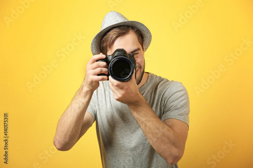 Handsome young photographer...