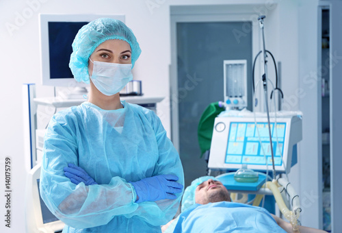 Young doctor in operating room of modern clinic