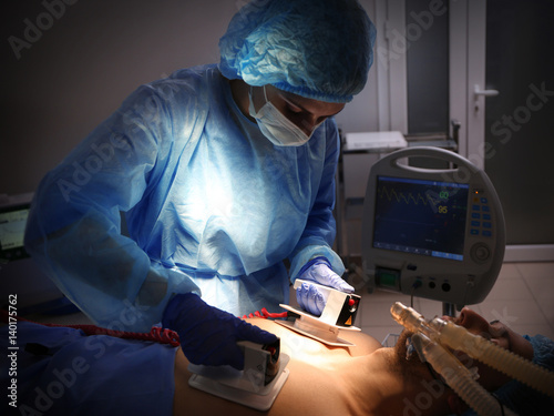 Doctor trying to save patie...