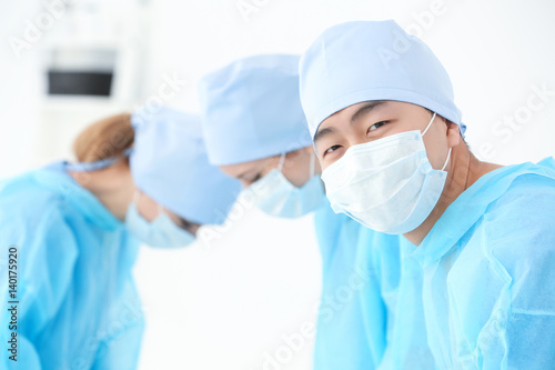 Young Asian doctor with col...