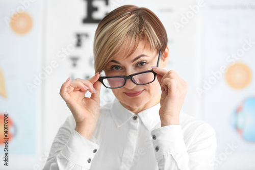 Mature woman wearing glasse...
