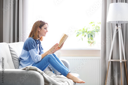 Young beautiful woman readi...