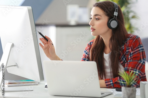 Young woman programmer work...