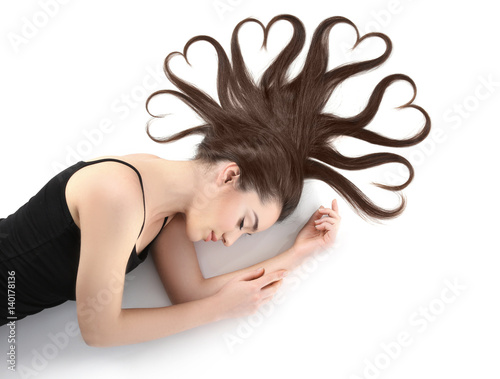 Beautiful young woman with ...
