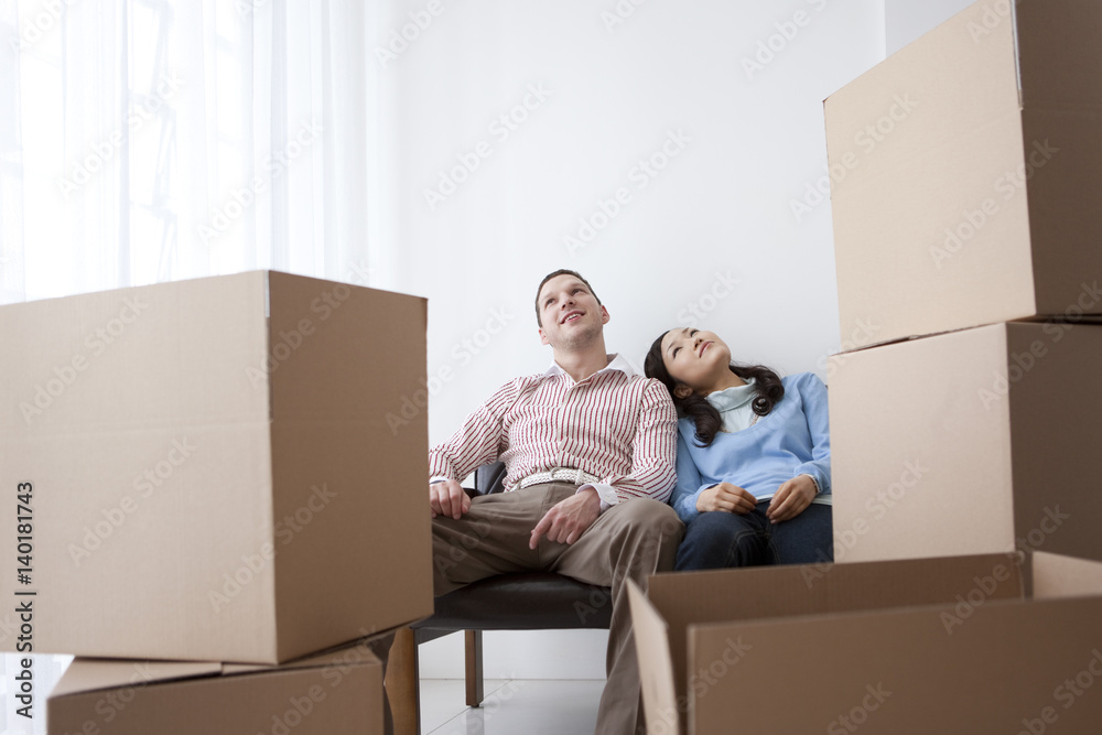 Couple Moving House Resting Couple Moving House Resting