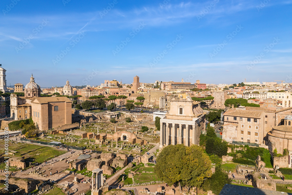Rome, Italy. Ruins of the Roman Forum: Curia Julia, the temple of the deified Julia, the temple of Vesta, the temple of Antoninus and Faustina