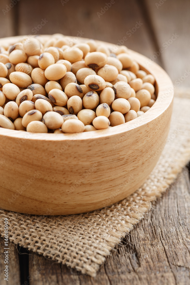 soybean cereal organic in bowl on wood background vertical view soybean cereal organic in bowl on wood background vertical view