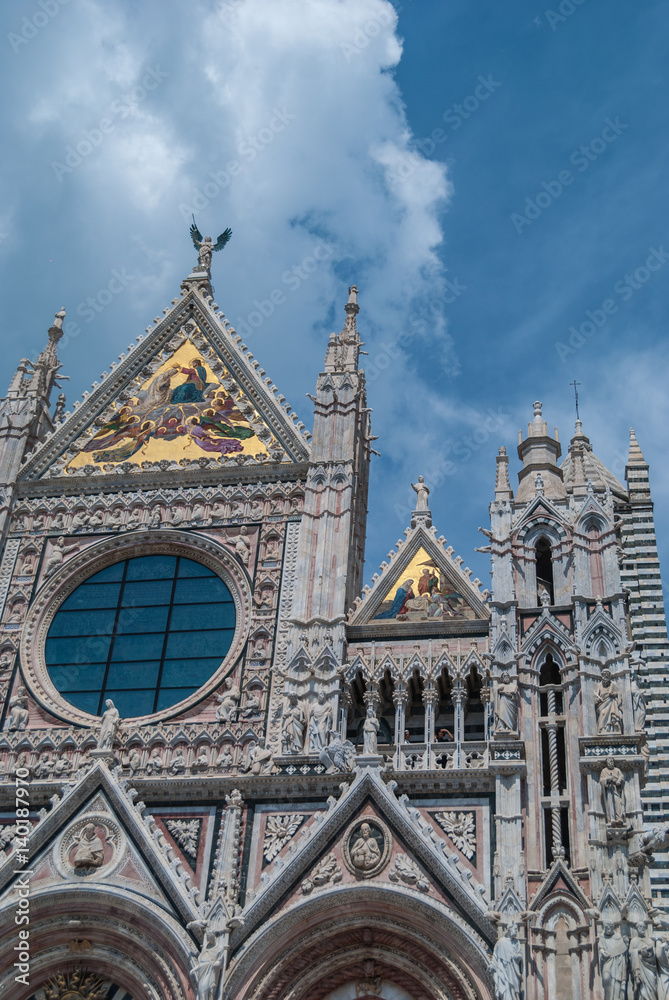 Italian renaissance cathedral white stone facade with deep blue sky above
