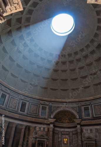 Roman dome temple with sunlight entering the circular opening on the roof