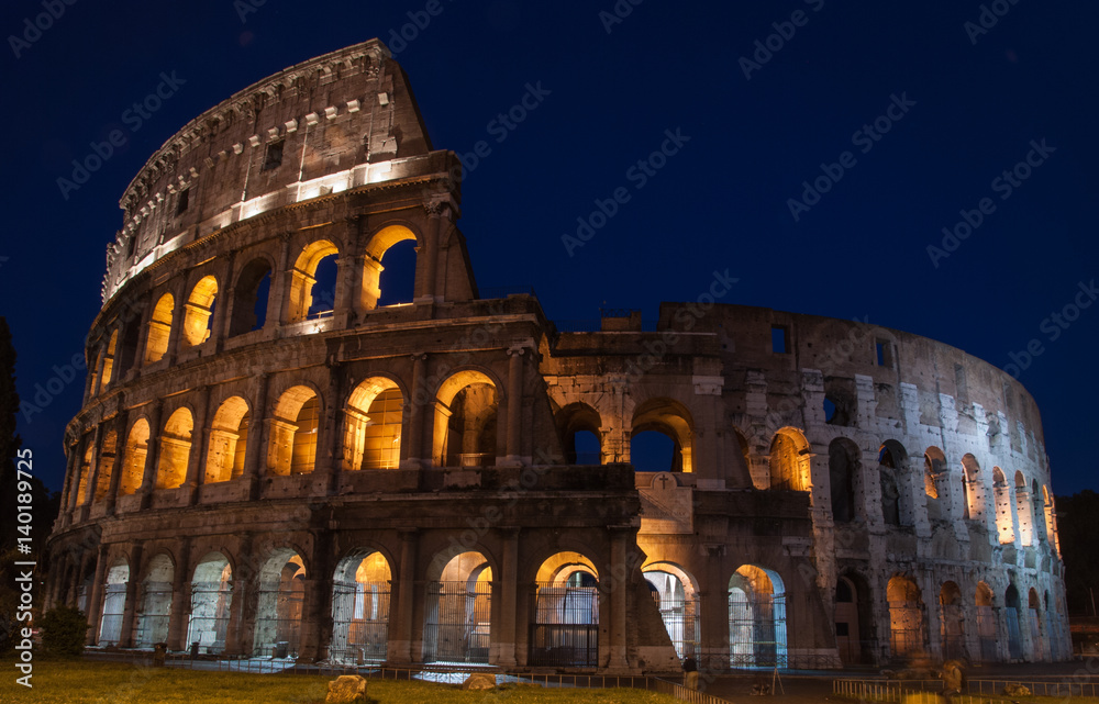 Colosseum in Rome, Italy, illuminated at night, isolated