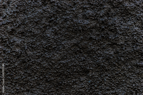 Grain dark painted wall texture background, black background